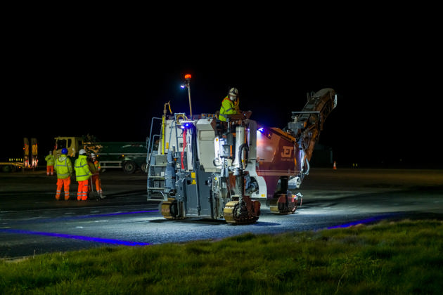 Night time airport runway laying